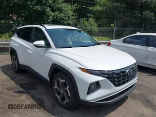 2022 Hyundai Tucson SEL z VIN 5NMJC3AEXNH137705, wystawiony jako IAAI lot #42494373 z przebiegiem 26 411 mil mil oraz . Historia ofert i sprzedaży dostępna na DreamBid. Obrazek 1.