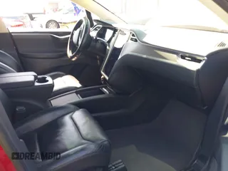 2016 Tesla Model X 70D with VIN 5YJXCAE23GF002262, listed as a IAAI auction lot 41839084 with 173,658 mi miles. Bid and sale history available at carsss.com. Image 5.