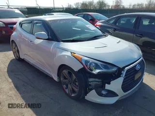 2015 Hyundai Veloster Turbo with VIN KMHTC6AE4FU234611, listed as a IAAI auction lot 42059915 with 107,388 mi miles. Bid and sale history available at carsss.com. Image 1.
