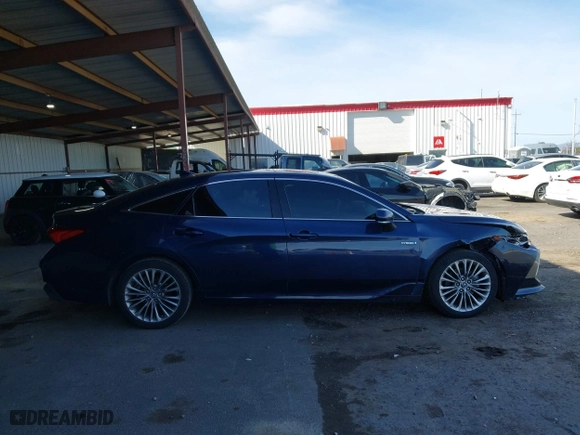 2019 Toyota Avalon Hybrid Limited with VIN 4T1B21FB5KU007633, listed as a IAAI auction lot 41615161 with 132,182 mi miles. Bid and sale history available at carsss.com. Image 13.