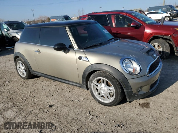 2009 MINI Hardtop S with VIN WMWMF73529TW82713, listed as a Copart auction lot 51152035 with 170,954 mi miles and Salvage title. Bid and sale history available at DreamBid. Image 4.