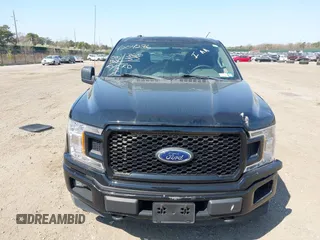 2018 Ford F-150 XL with VIN 1FTEW1EP2JFE13018, listed as a IAAI auction lot 42040276 with 97,563 mi miles. Bid and sale history available at carsss.com. Image 12.