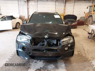 2018 BMW X5 xDrive35i z VIN 5UXKR0C5XJL075843, wystawiony jako IAAI lot #42146417 z przebiegiem 103 121 mil mil oraz . Historia ofert i sprzedaży dostępna na DreamBid. Obrazek 6.