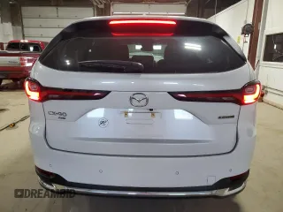 2024 Mazda CX-90 Premium z VIN JM3KKDHD8R1101691, wystawiony jako Copart lot #63206774 z przebiegiem 9 717 mil mil oraz Szkoda całkowita • Salvage title. Historia ofert i sprzedaży dostępna na DreamBid. Obrazek 6.