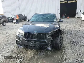 2017 BMW X5 xDrive50i with VIN 5UXKR6C54H0J84099, listed as a Copart auction lot 76269094 with 68,026 mi miles and Salvage title. Bid and sale history available at DreamBid. Image 14.