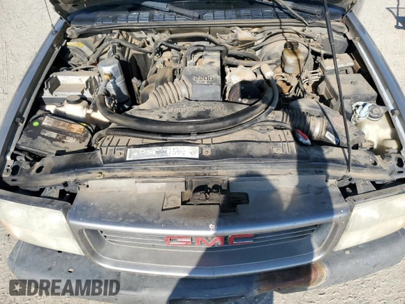 2001 GMC Sonoma SL with VIN 1GTCS14591K123515, listed as a Copart auction lot 67796064 with 313,545 mi miles and Salvage Title. Bid and sale history available at DreamBid. Image 11.