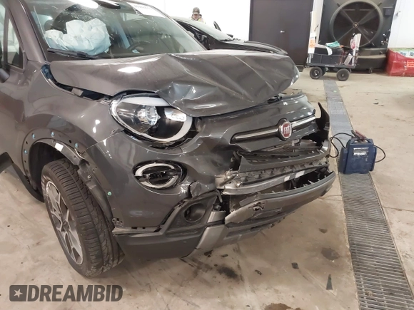 2021 FIAT 500X Trekking with VIN ZFBNF3B17MP909591, listed as a IAAI auction lot 41256551 with 58,688 mi miles and . Bid and sale history available at DreamBid. Image 6.