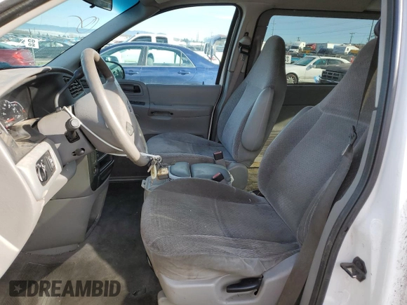 2001 Ford Windstar Cargo z VIN 2FTZA54471BB22773, wystawiony jako Copart lot #37283654 z przebiegiem 174 781 mil mil oraz Tytuł czysty. Historia ofert i sprzedaży dostępna na DreamBid. Obrazek 7.