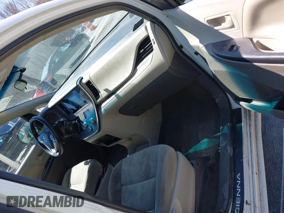 2015 Toyota Sienna L with VIN 5TDZK3DC3FS690484, listed as a IAAI auction lot 41888073 with 201,518 mi miles and . Bid and sale history available at carsss.com. Image 5.