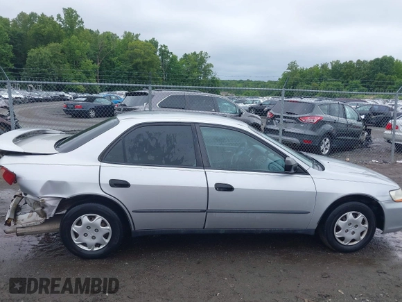 2000 Honda Accord DX z VIN 1HGCF8643YA095133, wystawiony jako IAAI lot #42377541 z przebiegiem 137 515 mil mil oraz . Historia ofert i sprzedaży dostępna na DreamBid. Obrazek 14.