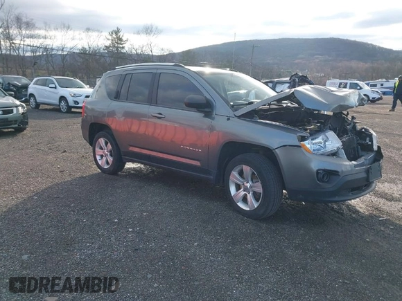 2012 Jeep Compass Sport with VIN 1C4NJDBB2CD577392, listed as a IAAI auction lot 41897809 with 20,801 mi miles. Bid and sale history available at carsss.com. Image 1.