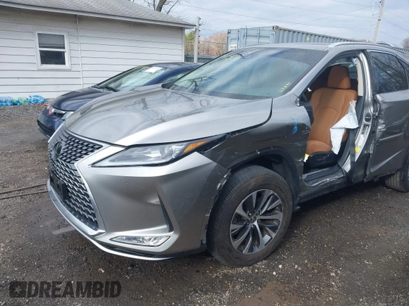 2022 Lexus RX with VIN 2T2HZMDA5NC326016, listed as a IAAI auction lot 40966492 with 22,633 mi miles. Bid and sale history available at carsss.com. Image 6.
