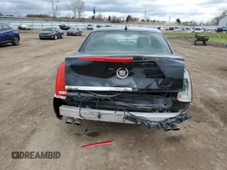 2007 Cadillac DTS Performance with VIN 1G6KD57937U201301, listed as a Copart auction lot 52868565 with 119,972 mi miles and Salvage Title. Bid and sale history available at carsss.com. Image 6.