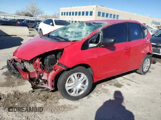 2010 Honda Fit with VIN JHMGE8H26AC010616, listed as a Copart auction lot 80514404 with 114,021 mi miles and Salvage title. Bid and sale history available at DreamBid. Image 1.