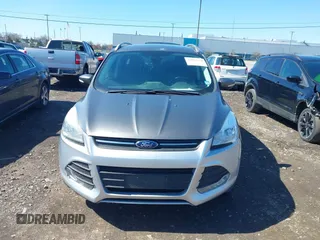 2014 Ford Escape Titanium with VIN 1FMCU9JX1EUB94776, listed as a IAAI auction lot 42063678 with 138,036 mi miles. Bid and sale history available at carsss.com. Image 12.