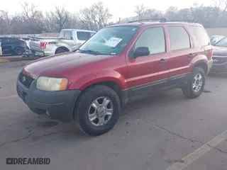 2003 Ford Escape XLT Popular 2 with VIN 1FMYU93143KC54170, listed as a IAAI auction lot 41763124 with 271,432 mi miles. Bid and sale history available at carsss.com. Image 2.