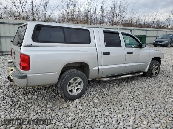 2007 Dodge Dakota SLT with VIN 1D7HW48P97S197684, listed as a Copart auction lot 86328944 with 122,969 mi miles and Salvage Title. Bid and sale history available at carsss.com. Image 3.