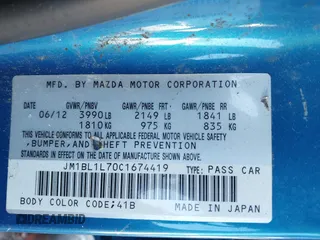 2012 Mazda Mazda3 i Touring with VIN JM1BL1L70C1674419, listed as a IAAI auction lot 40902429 with Not Provided miles. Bid and sale history available at carsss.com. Image 9.
