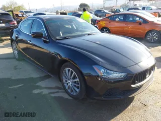 2014 Maserati Ghibli S Q4 with VIN ZAM57RTA2E1086046, listed as a IAAI auction lot 41846389 with 55,984 mi miles. Bid and sale history available at carsss.com. Image 1.