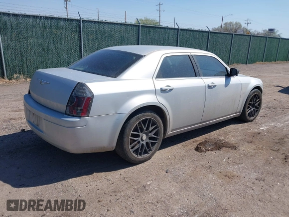 2007 Chrysler 300 with VIN 2C3KA43R67H664434, listed as a IAAI auction lot 41884172 with 238,451 mi miles. Bid and sale history available at carsss.com. Image 4.