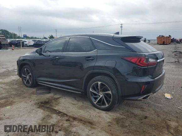 2017 Lexus RX 350 with VIN 2T2BZMCA9HC129460, listed as a Copart auction lot 57301995 with 163,128 mi miles and Salvage title. Bid and sale history available at DreamBid. Image 2.
