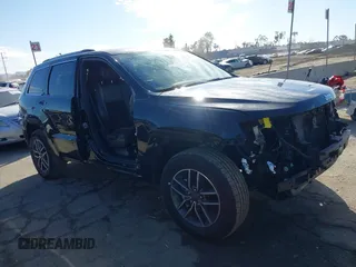 2019 Jeep Grand Cherokee Altitude with VIN 1C4RJEAG7KC852263, listed as a IAAI auction lot 41590946 with 83,356 mi miles and . Bid and sale history available at DreamBid. Image 14.