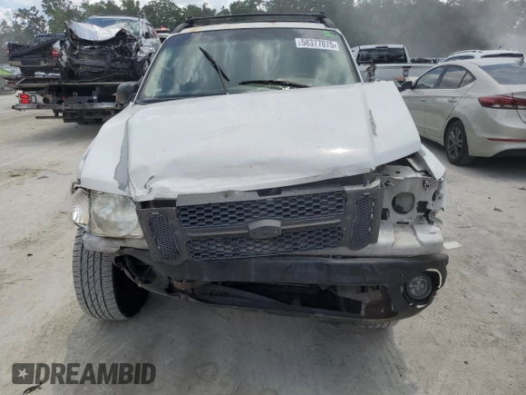 2003 Ford Explorer Sport Trac XLS with VIN 1FMZU67E43UB37127, listed as a Copart auction lot 58377075 with 219,033 mi miles and Salvage title. Bid and sale history available at DreamBid. Image 5.