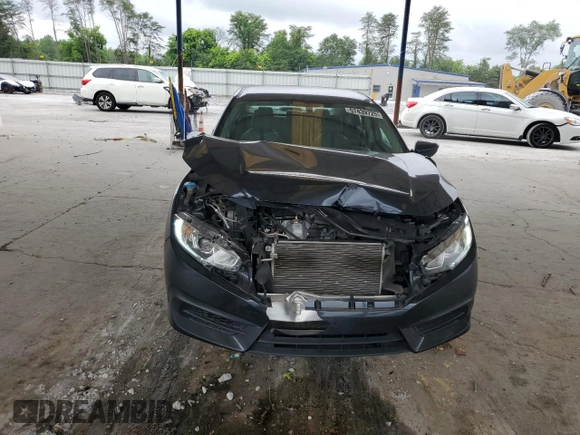 2017 Honda Civic LX z VIN 19XFC2F54HE014695, wystawiony jako Copart lot #57439725 z przebiegiem 88 092 mil mil oraz Szkoda całkowita • Salvage title. Historia ofert i sprzedaży dostępna na DreamBid. Obrazek 5.