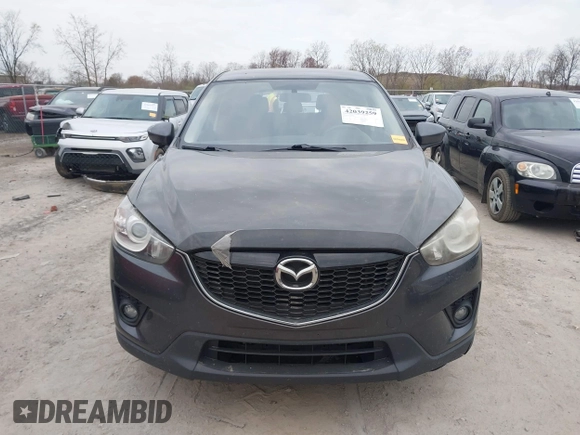 2015 Mazda CX-5 Touring with VIN JM3KE4CY1F0439016, listed as a IAAI auction lot 42039259 with 201,325 mi miles and . Bid and sale history available at carsss.com. Image 12.