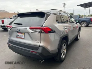 2021 Toyota RAV4 Hybrid LE z VIN 4T3B6RFV3MU049810, wystawiony jako IAAI lot #42655937 z przebiegiem 61 066 mil mil oraz . Historia ofert i sprzedaży dostępna na DreamBid. Obrazek 1.