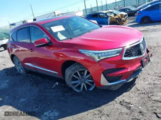 2019 Acura RDX w/Technology Pkg with VIN 5J8TC2H54KL013305, listed as a IAAI auction lot 41748901 with 63,439 mi miles. Bid and sale history available at carsss.com. Image 1.