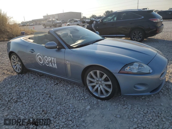 2007 Jaguar XK with VIN SAJWA44BX75B09612, listed as a Copart auction lot 75139114 with 86,094 mi miles and Salvage Title. Bid and sale history available at carsss.com. Image 4.
