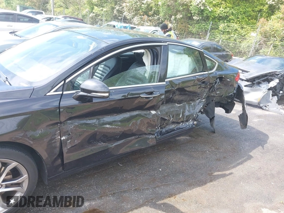 2019 Ford Fusion SEL with VIN 3FA6P0CD5KR182520, listed as a IAAI auction lot 42014190 with 107,028 mi miles and . Bid and sale history available at carsss.com. Image 6.