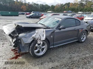 2004 Ford Mustang Premium Mach 1 with VIN 1FAFP42R44F233610, listed as a Copart auction lot 81661954 with 148,217 mi miles and Salvage title. Bid and sale history available at DreamBid. Image 1.