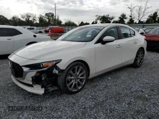 2021 Mazda 3 Select z VIN JM1BPABL9M1334013, wystawiony jako Copart lot #62838715 z przebiegiem 104 133 mil mil oraz Szkoda całkowita • Salvage title. Historia ofert i sprzedaży dostępna na DreamBid. Obrazek 1.