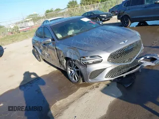 2023 Genesis G70 2.0T with VIN KMTG34TA2PU127032, listed as a IAAI auction lot 41827809 with 25,162 mi miles. Bid and sale history available at carsss.com. Image 1.