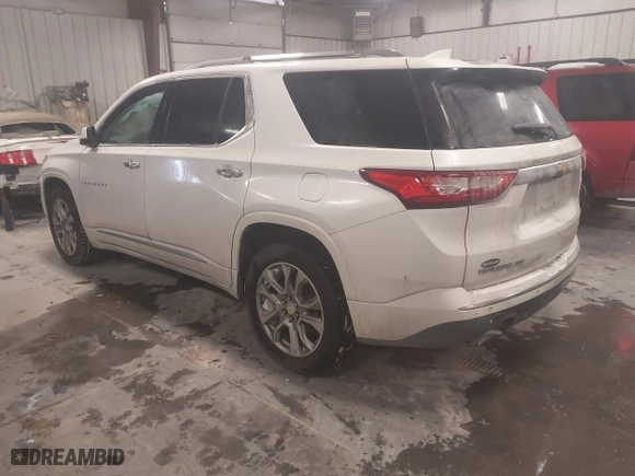 2018 Chevrolet Traverse Premier with VIN 1GNEVJKW2JJ103924, listed as a IAAI auction lot 41576128 with 128,694 mi miles. Bid and sale history available at carsss.com. Image 3.