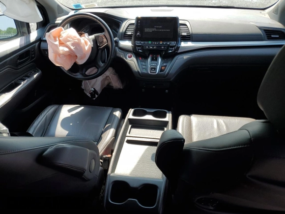 2019 Honda Odyssey Touring with VIN 5FNRL6H81KB051846, listed as a Copart auction lot 58723015 with 68,142 mi miles and Salvage title. Bid and sale history available at DreamBid. Image 8.