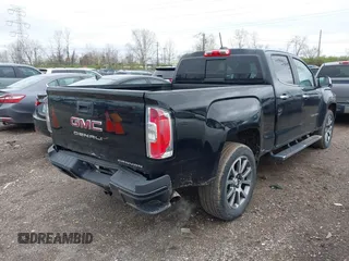 2021 GMC Canyon 4WD Denali with VIN 1GTG6EEN6M1260580, listed as a IAAI auction lot 41918693 with 52,085 mi miles. Bid and sale history available at carsss.com. Image 4.