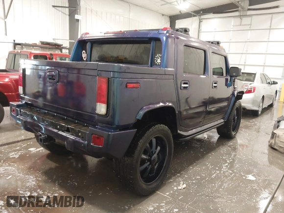 2006 Hummer H2 z VIN 5GRGN22U06H103603, wystawiony jako IAAI lot #41992767 z przebiegiem 165 782 mil mil oraz . Historia ofert i sprzedaży dostępna na DreamBid. Obrazek 4.