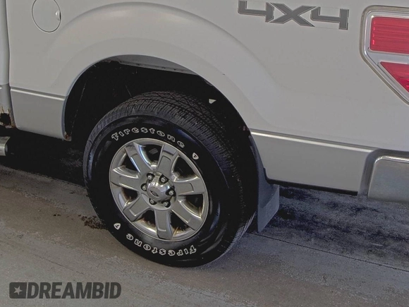 2014 Ford F-150 XL with VIN 1FTFW1EF9EFB59177, listed as a IAAI auction lot 42281089 with 184,239 mi miles and . Bid and sale history available at DreamBid. Image 1.