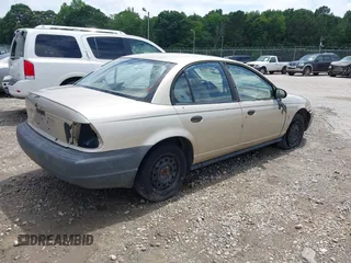 1998 Saturn SL z VIN 1G8ZH5281WZ186775, wystawiony jako IAAI lot #42454428 z przebiegiem Nie podano mil oraz . Historia ofert i sprzedaży dostępna na DreamBid. Obrazek 4.