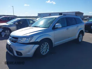 2013 Dodge Journey SXT with VIN 3C4PDDBG4DT506900, listed as a IAAI auction lot 42032379 with 130,911 mi miles and . Bid and sale history available at DreamBid. Image 17.