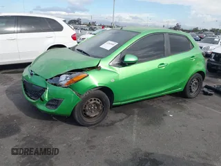 2012 Mazda 2 Sport with VIN JM1DE1KZ4C0140559, listed as a IAAI auction lot 41265959 with 139,364 mi miles and . Bid and sale history available at DreamBid. Image 2.