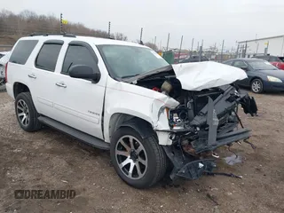 2014 Chevrolet Tahoe LS with VIN 1GNSKAE00ER109649, listed as a IAAI auction lot 41880956 with 155,656 mi miles and . Bid and sale history available at DreamBid. Image 1.