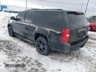 2008 Chevrolet Suburban 2LT with VIN 3GNFK16388G105623, listed as a IAAI auction lot 41441593 with 167,122 mi miles and . Bid and sale history available at DreamBid. Image 3.