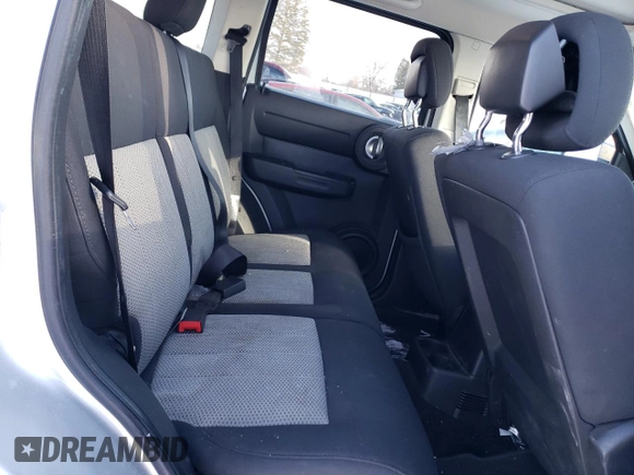 2010 Dodge Nitro Heat with VIN 1D4PU4GK5AW175296, listed as a Copart auction lot 87819235 with 168,542 mi miles and Clean title. Bid and sale history available at DreamBid. Image 11.