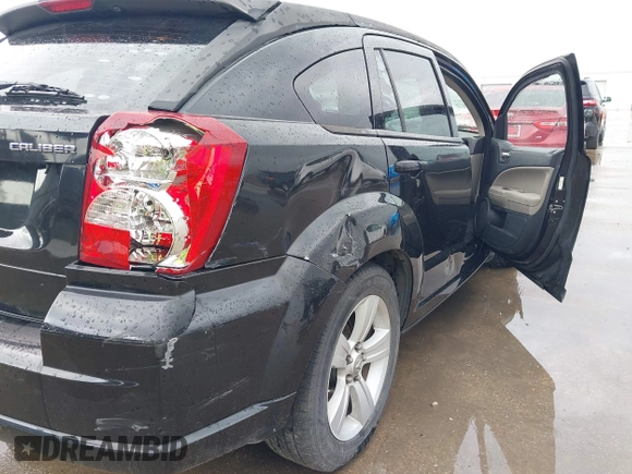 2010 Dodge Caliber Mainstreet z VIN 1B3CB3HA5AD643719, wystawiony jako IAAI lot #41940088 z przebiegiem 173 204 mil mil oraz . Historia ofert i sprzedaży dostępna na DreamBid. Obrazek 19.
