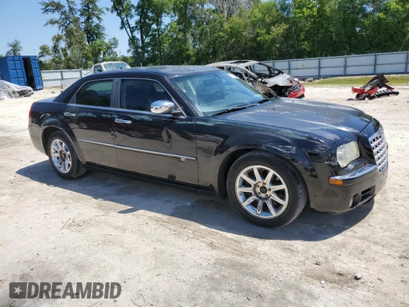 2008 Chrysler 300 C Hemi with VIN 2C3KA63H08H156142, listed as a Copart auction lot 53741595 with 216,677 mi miles and Salvage Title. Bid and sale history available at carsss.com. Image 4.