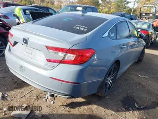 2021 Honda Accord Touring with VIN 1HGCV3F91MA002413, listed as a IAAI auction lot 40682887 with 101,653 mi miles and . Bid and sale history available at DreamBid. Image 4.